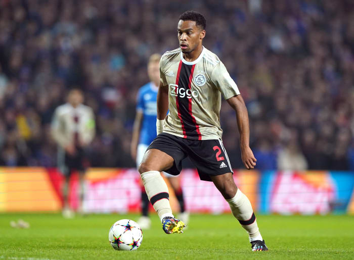 Jurrien Timber pictured in November 2022 playing for Ajax in a UEFA Champions League game against Rangers